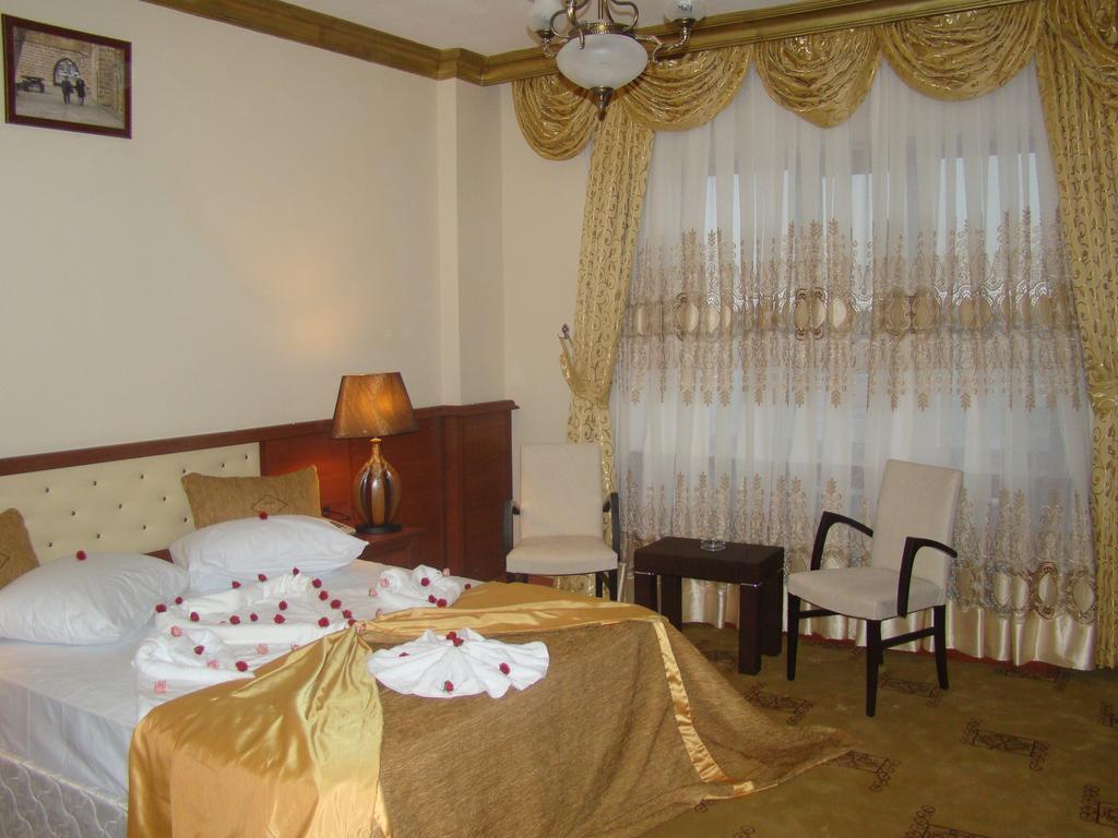 Estel Otel Midyat Bilik gambar